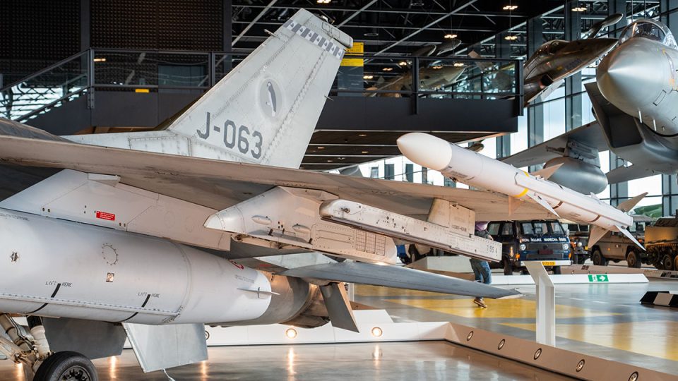 The J-063 is displayed as it returned after the aerial victory, without an AMRAAM missile on station 2.
